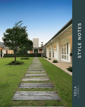 Style Notes: a stone path across the lawn to the front door