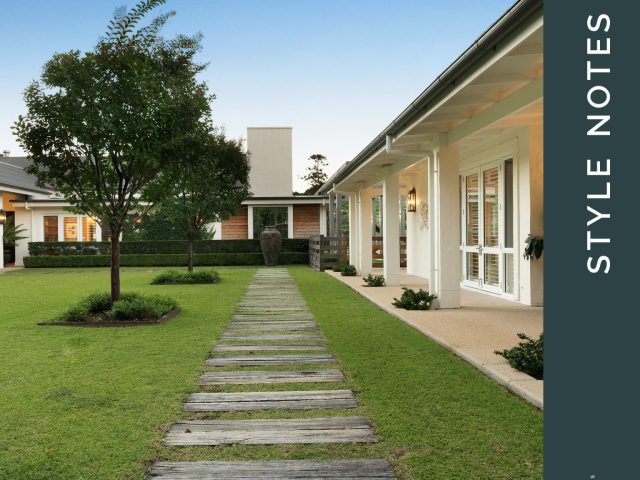 Style Notes: a stone path across the lawn to the front door